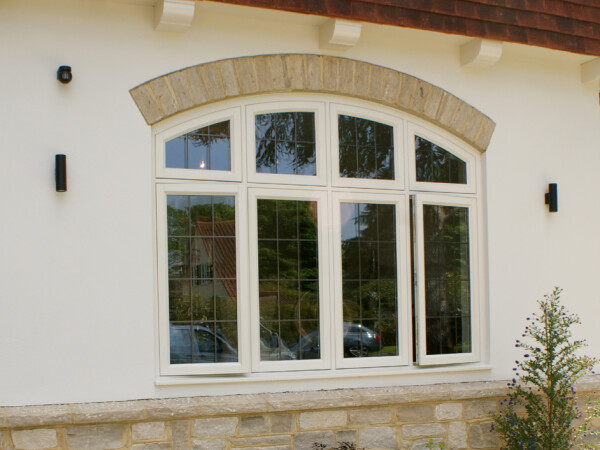 close up of curved casement window