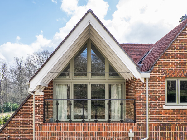 glass french doors leading to a balcony