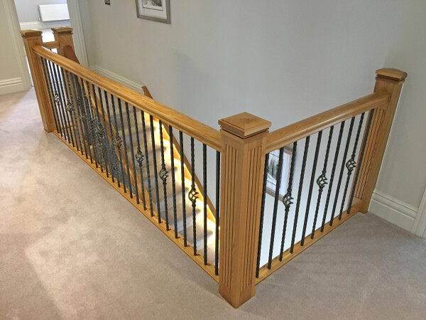 hallway banister with metal balustrade