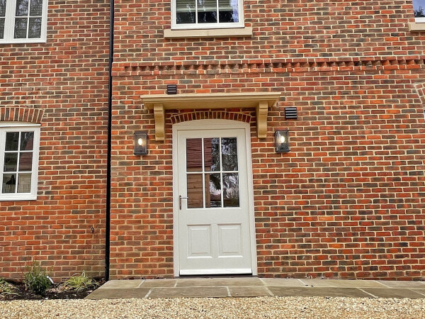 white traditional cottage style front door