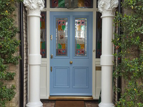stained glass panel and timber front door