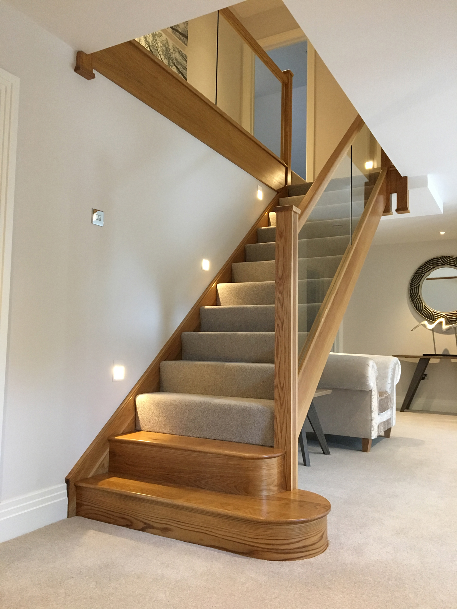 timber staircase with glass balustrade