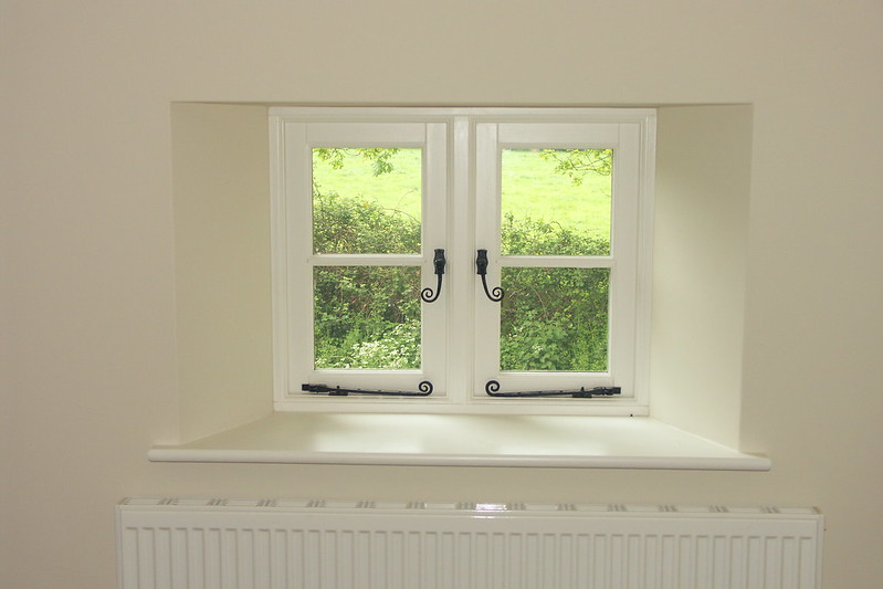 casement windows with monkey tail